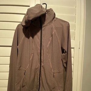 Lulu Lemon black and pink stripe windbreaker jacket. Size 6